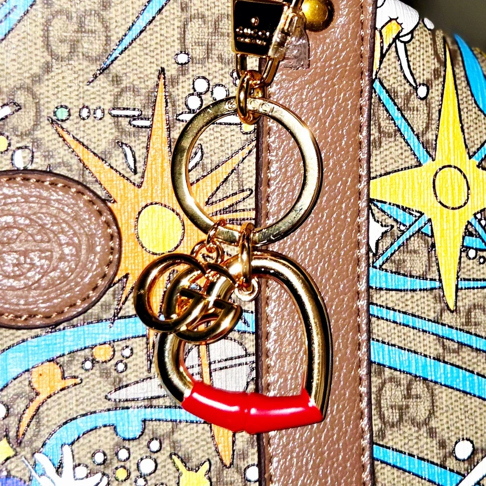 Heart-shaped keychain with red enamel